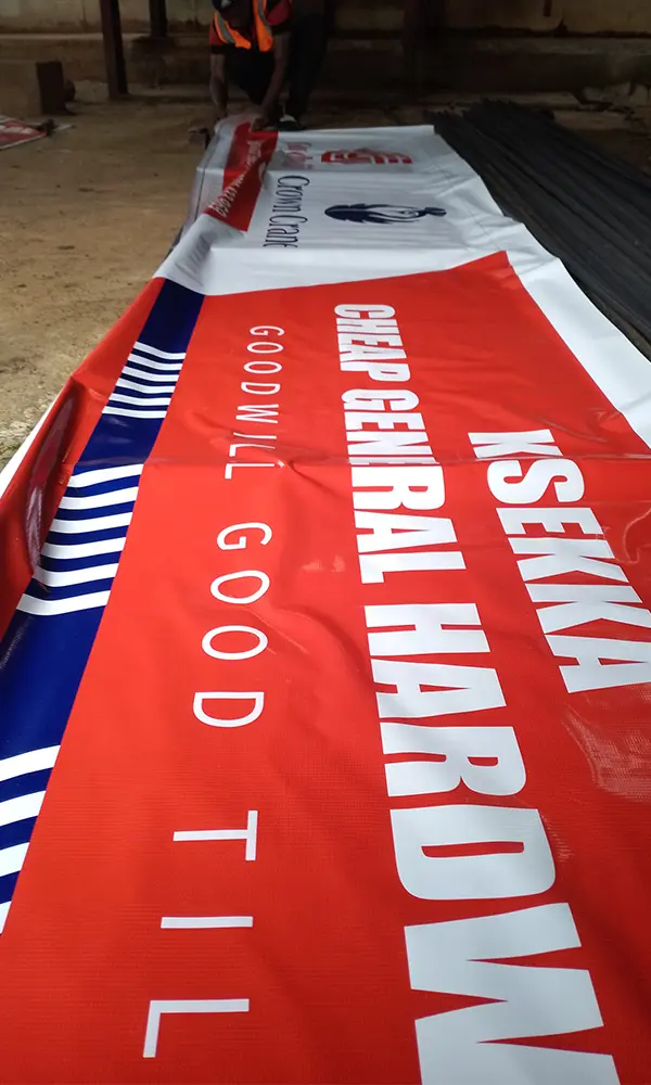 Large Goodwill hardware-front PVC signage being stretched onto its fabricated frame
