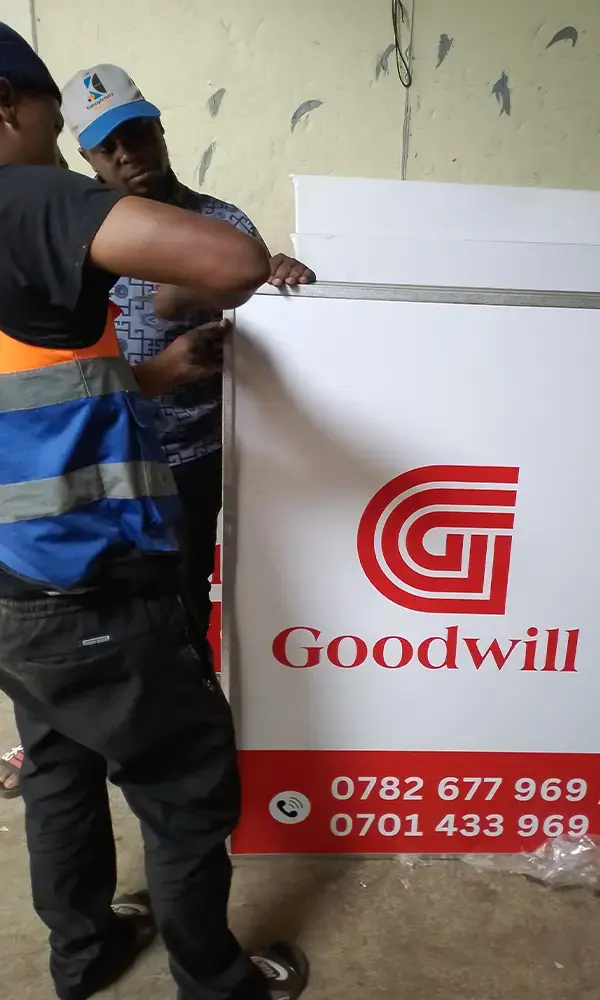 Close-up of aluminium edge finishing on Goodwill hardware signage