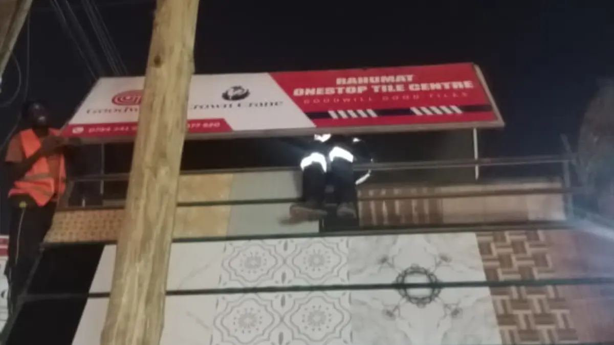 Night mounting with the crew in reflective PPE at Rahumat • Nalukolongo for the Goodwill and Crown Crane rollout