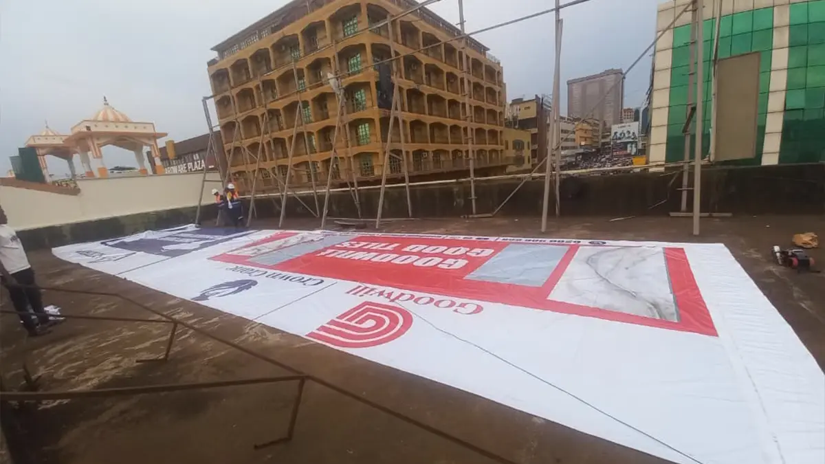 Goodwill 20-metre PVC billboard unfolded across the Nakasero rooftop