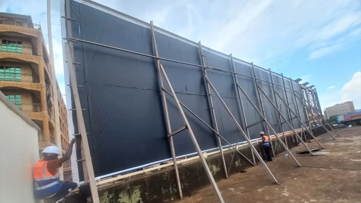 Rear view showing the installed face extending across the rooftop structure