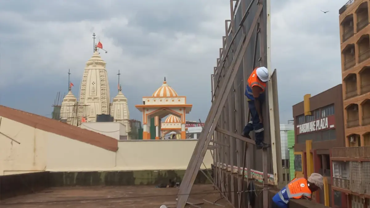 Goodwill billboard being tensioned from the side of the Nakasero structure