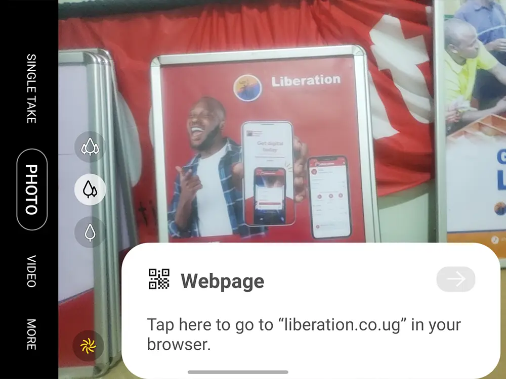 QR code testing on the Liberation App snapper frame, confirming scan readiness even with protective sheet visibility.