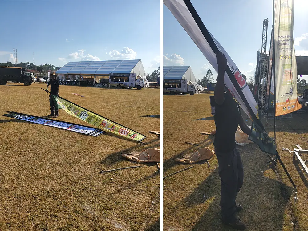 Field setup support — Kamog Artistry team supporting the setup of telescopic teardrop flags around the event field.