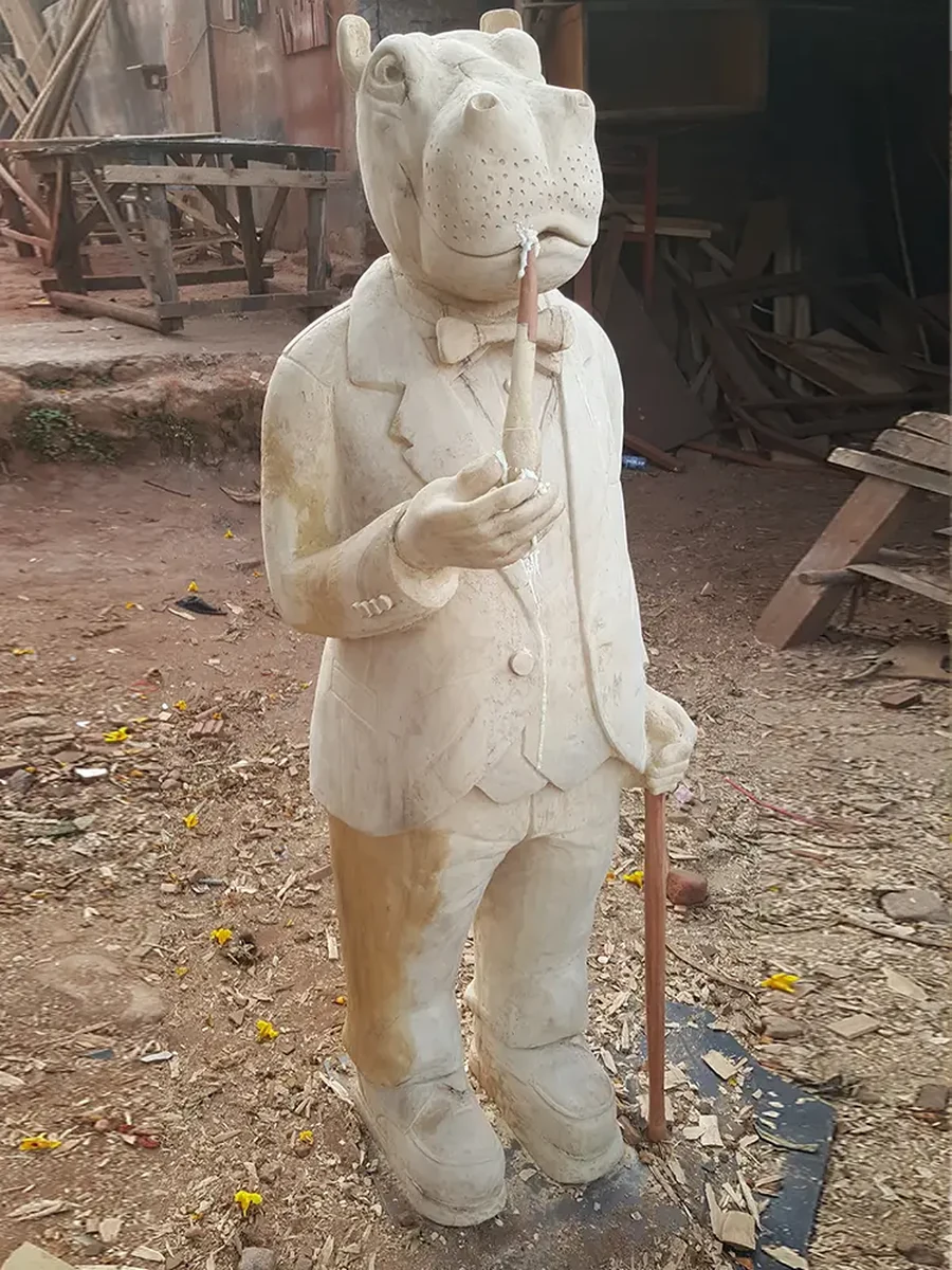 Front full body view of Gentleman Hippo sculpture by Bobby Otto