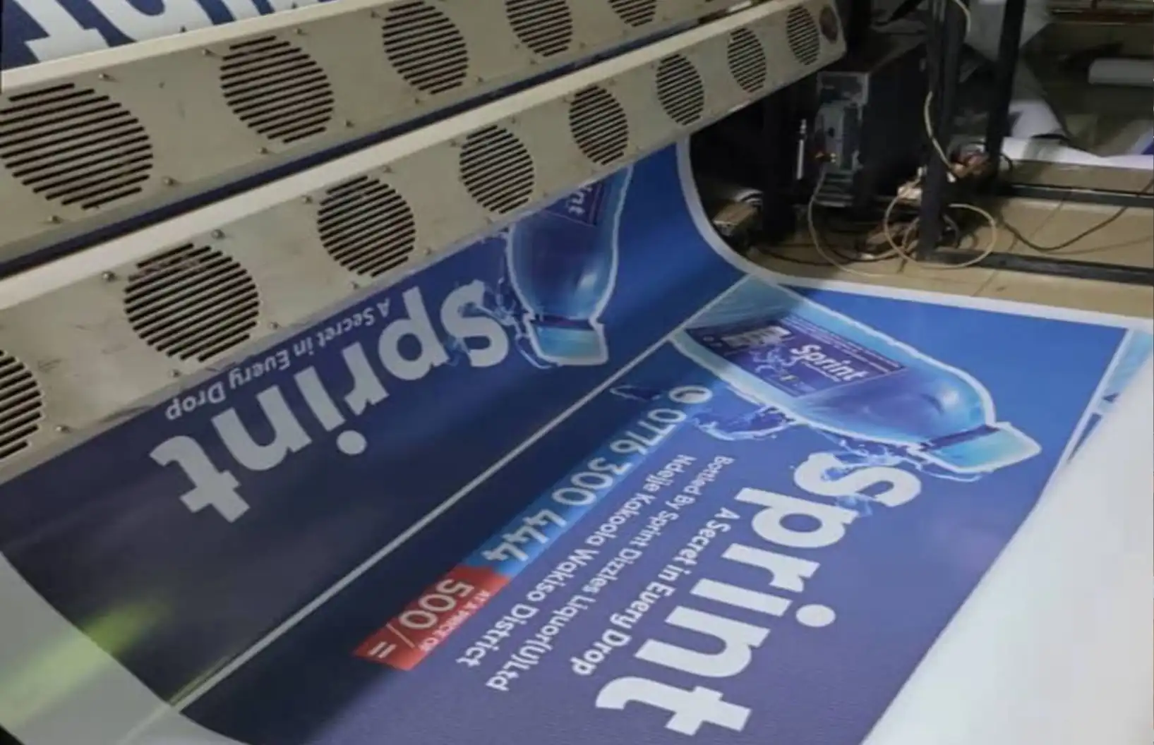 Outdoor PVC banner printing in Kampala finished with eyelets for mounting.
